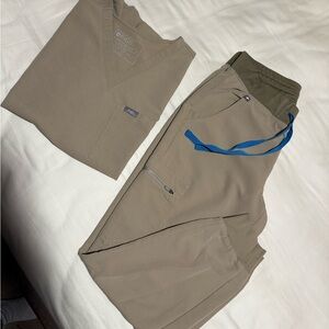 Figs woman’s Khaki Cargo scrub set with Blue Accent ribbons.